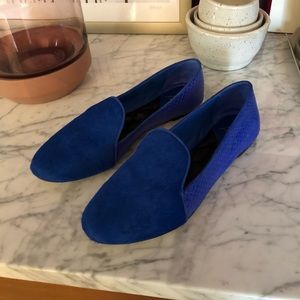 Blue Brian Atwood smoking slippers.